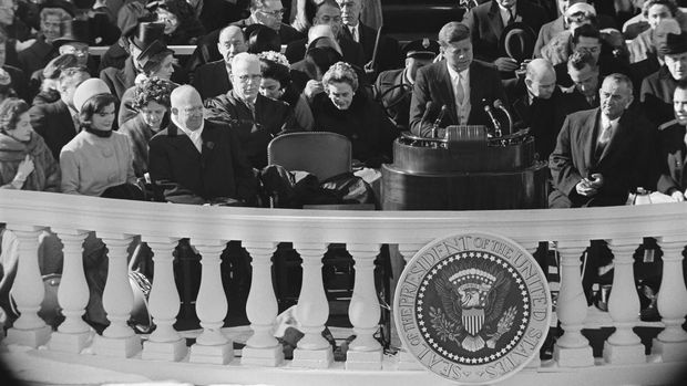  US first lady Jacqueline Kennedy (2nd L), US former President Dwight D. Eisenhower (3rd L) and US Vice President Lyndon Johnson. John Fitzgerald Kennedy (1917-1963) became the 35th President of the United States on January 20, 1961 and was the first Catholic, and the youngest to be elected to this office. He was assassinated on November 22, 1963 in Dallas, Texas, during an electoral tour. (Photo by SAM SCHULMAN / AFP)