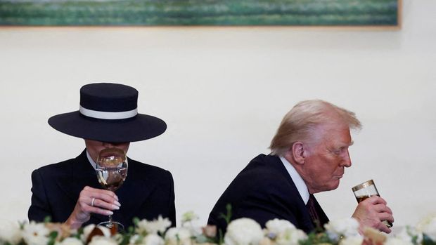 U.S. President Donald Trump and U.S. first lady Melania Trump attend the luncheon in the Statuary Hall of the U.S. Capitol on the inauguration day of Trump's second Presidential term in Washington, U.S., January 20, 2025. REUTERS/Evelyn Hockstein     TPX IMAGES OF THE DAY