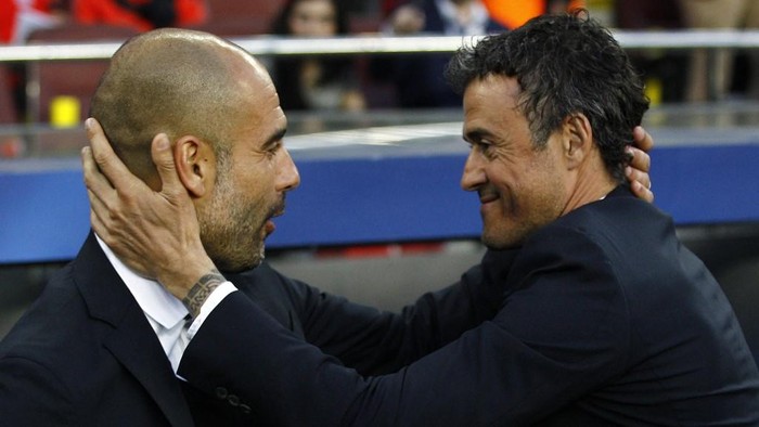 Bayern Munichs Spanish head coach Pep Guardiola (L) and Barcelonas coach Luis Enrique greet each other before the UEFA Champions League football match FC Barcelona vs FC Bayern Muenchen at the Camp Nou stadium in Barcelona on May 6, 2015.     AFP PHOTO/ QUIQUE GARCIA (Photo by QUIQUE GARCIA / AFP)