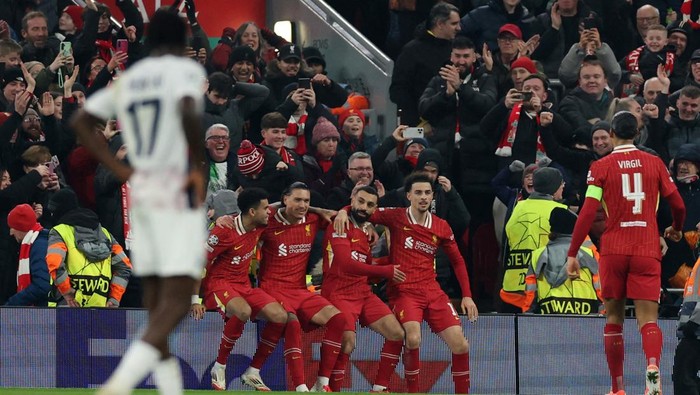 Soccer Football - Champions League - Liverpool v Lille - Anfield, Liverpool, Britain - January 21, 2025 Liverpools Mohamed Salah celebrates scoring their first goal with Liverpools Luis Diaz, Liverpools Darwin Nunez and Liverpools Curtis Jones REUTERS/Phil Noble