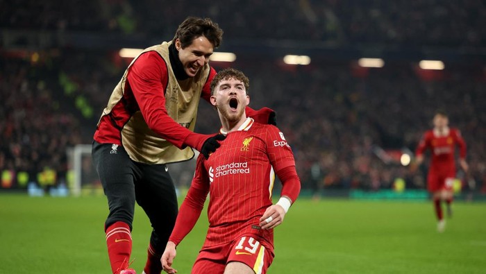 Soccer Football - Champions League - Liverpool v Lille - Anfield, Liverpool, Britain - January 21, 2025 Liverpools Harvey Elliott celebrates with Federico Chiesa after scoring their second goal REUTERS/Phil Noble