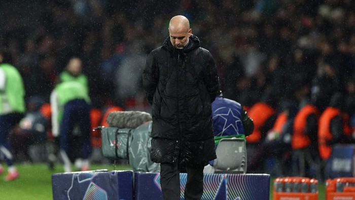 Manchester Citys Spanish manager Pep Guardiola gestures during the UEFA Champions League, league phase football match between Paris Saint-Germain and Manchester City at the Parc des Princes Stadium in Paris on January 22, 2025. (Photo by FRANCK FIFE / AFP)