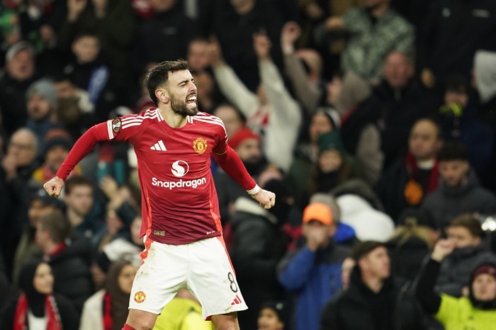 Bruno Fernandes Manchester United's Bruno Fernandes celebrates after scoring his side's second goal during the Europa League opening phase soccer match between Manchester United and Glasgow Rangers in Manchester, England, Thursday, Jan. 2025. (AP Photo/Dave Thompson)