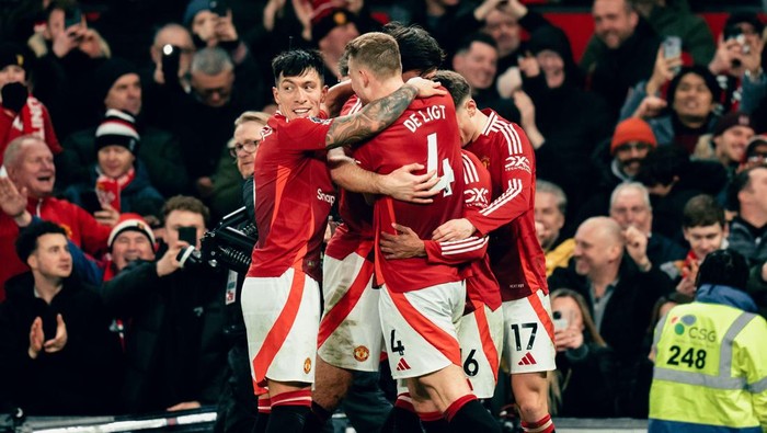 MANCHESTER, ENGLAND - JANUARY 16: Amad of Manchester United celebrates scoring their third goal during the Premier League match between Manchester United FC and Southampton FC at Old Trafford on January 16, 2025 in Manchester, England. (Photo by Zohaib Alam - MUFC/Manchester United via Getty Images)