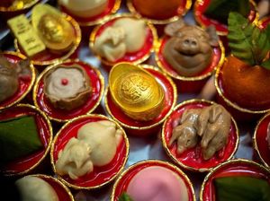 Imlek di Asia Tenggara, Lempar Jeruk Sampai Mandi Air Rebusan Ketumbar