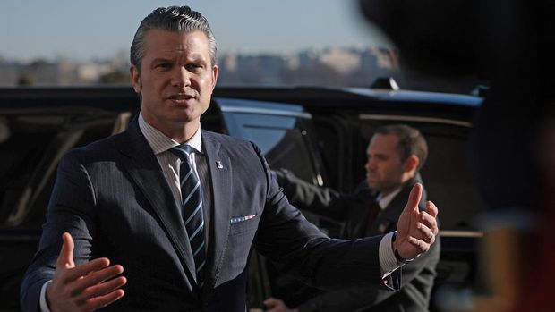  U.S. Secretary of Defense Pete Hegseth answers questions while arriving at the Pentagon for the first time since being confirmed January 27, 2025 in Arlington, Virginia. Hegseth answered questions from reporters briefly before entering the Pentagon.   Win McNamee/Getty Images/AFP (Photo by WIN MCNAMEE / GETTY IMAGES NORTH AMERICA / Getty Images via AFP)