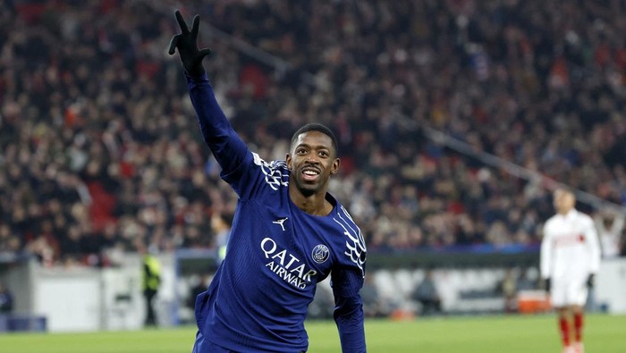 Soccer Football - Champions League - VfB Stuttgart v Paris St Germain - MHPArena, Stuttgart, Germany - January 29, 2025  Paris St Germains Ousmane Dembele celebrates scoring their fourth goal and completes his hat-trick REUTERS/Heiko Becker