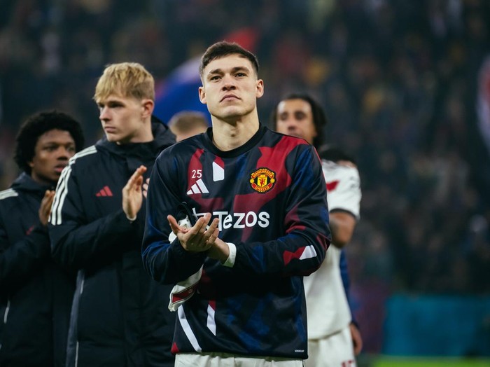 BUCHAREST, ROMANIA - JANUARY 30:  Manuel Ugarte of Manchester United applauds the fans at the end of the UEFA Europa League 2024/25 League Phase MD8 match between Fotbal Club FCSB and Manchester United at National Arena on January 30, 2025 in Bucharest, Romania. (Photo by Ash Donelon/Manchester United via Getty Images)