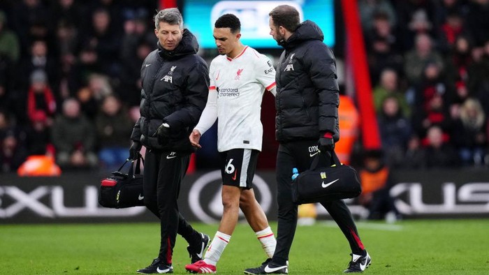 Liverpools Trent Alexander-Arnold (centre) leaves the pitch with medical staff after going down injured during the Premier League match at the Vitality Stadium, Bournemouth. Picture date: Saturday February 1, 2025. (Photo by John Walton/PA Images via Getty Images)