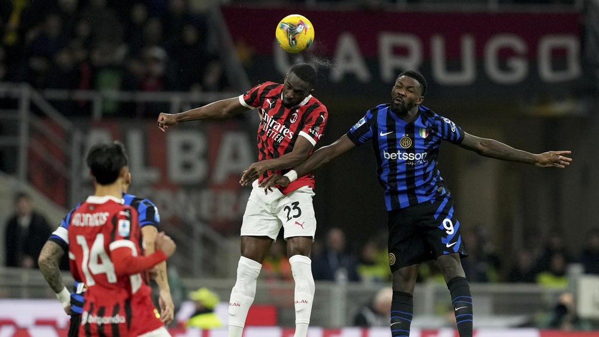 Laga AC Milan vs Inter Milan berakhir 1-1 (Foto: AP/Antonio Calanni)