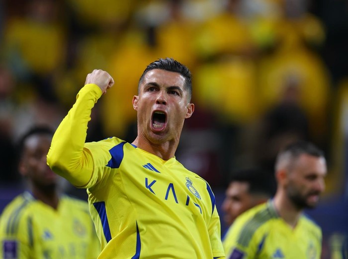 RIYADH, SAUDI ARABIA - FEBRUARY 03: Cristiano Ronaldo of Al Nassr celebrates after scoring the third goal of his team during the AFC Champions League Elite match between Al-Nassr and Al Wasl at King Saud University Stadium on February 03, 2025 in Riyadh, Saudi Arabia. (Photo by Al Nassr FC/Al Nassr FC via Getty Images)