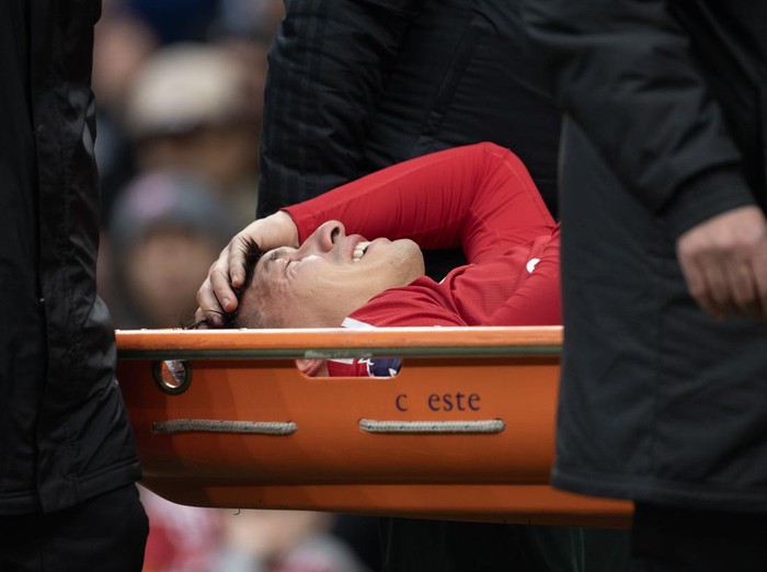 MANCHESTER, ENGLAND - FEBRUARY 2: Lisandro Martinez of Manchester United is stretchered off after sustaining an injury during the Premier League match between Manchester United FC and Crystal Palace FC at Old Trafford on February 2, 2025 in Manchester, England. (Photo by Joe Prior/Visionhaus via Getty Images)