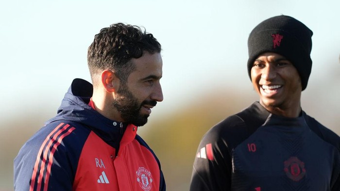 Manchester United manager Ruben Amorim with Marcus Rashford during a training session at Carrington Training Centre, Manchester. Picture date: Wednesday November 27, 2024. (Photo by Martin Rickett/PA Images via Getty Images)