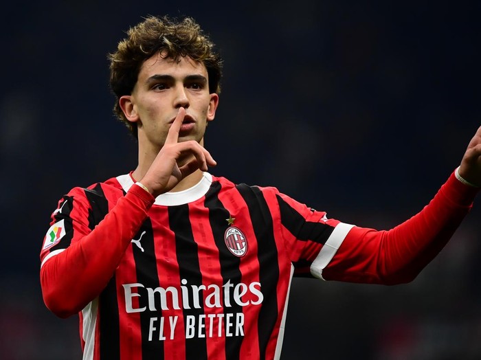 MILAN, ITALY - FEBRUARY 5: Joao Félix of AC Milan celebrates after scoring his team third goal during the Italian Coppa Italia football match AC Milan vs AS Roma at San Siro Stadium in Milan, Italy on February 5, 2025 (Photo by Piero Cruciatti/Anadolu via Getty Images)