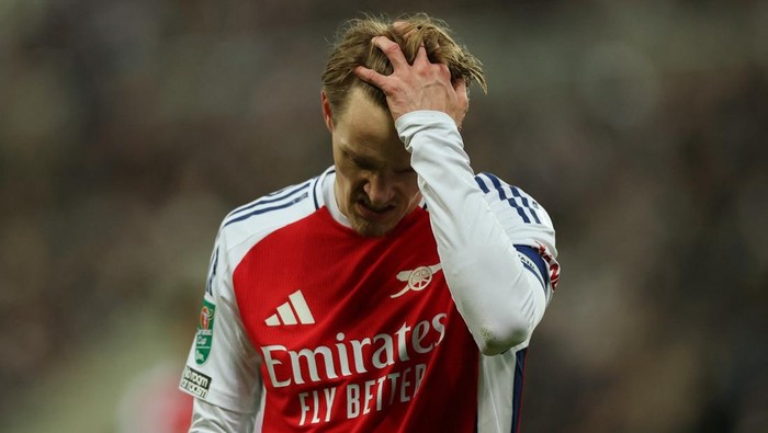 Soccer Football - Carabao Cup - Semi Final - Second Leg - Newcastle United v Arsenal - St James Park, Newcastle, Britain - February 5, 2025 Arsenals Martin Odegaard reacts Action Images via Reuters/Lee Smith EDITORIAL USE ONLY. NO USE WITH UNAUTHORIZED AUDIO, VIDEO, DATA, FIXTURE LISTS, CLUB/LEAGUE LOGOS OR LIVE SERVICES. ONLINE IN-MATCH USE LIMITED TO 120 IMAGES, NO VIDEO EMULATION. NO USE IN BETTING, GAMES OR SINGLE CLUB/LEAGUE/PLAYER PUBLICATIONS. PLEASE CONTACT YOUR ACCOUNT REPRESENTATIVE FOR FURTHER DETAILS..