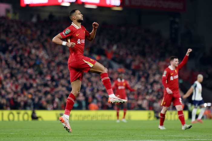 LIVERPOOL, ENGLAND - FEBRUARY 06: (THE SUN OUT, THE SUN ON SUNDAY OUT) Cody Gakpo of Liverpool celebrates scoring his teams first goal during the Carabao Cup Semi Final Second Leg match between Liverpool and Tottenham Hotspur at Anfield on February 06, 2025 in Liverpool, England. (Photo by Liverpool FC/Liverpool FC via Getty Images)