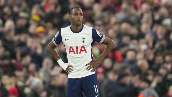 Tottenhams Mathys Tel stands on the pitch during the English League Cup semifinal second leg soccer match between Liverpool and Tottenham Hotspur at Anfield Stadium in Liverpool, England, Thursday, Feb. 6, 2025. (AP Photo/Jon Super)