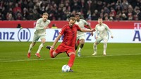 2. Harry Kane – 32 (25 gol, 7 assist). Foto: AP/Matthias Schrader