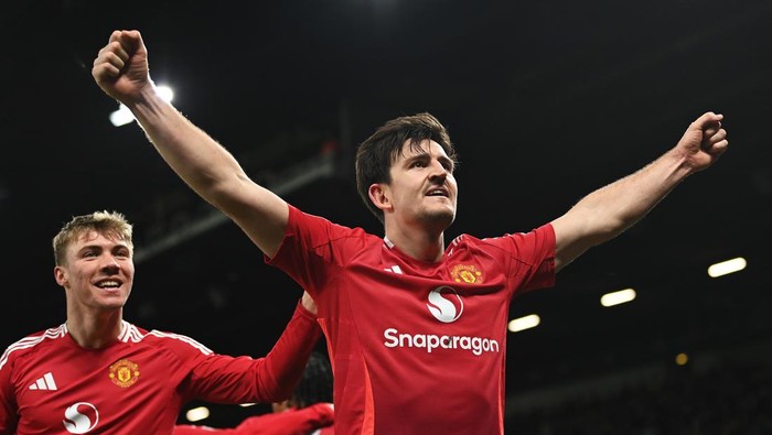MANCHESTER, ENGLAND - FEBRUARY 07: Harry Maguire of Manchester United celebrates scoring his teams second goal during the Emirates FA Cup Fourth Round match between Manchester United and Leicester City at Old Trafford on February 07, 2025 in Manchester, England. (Photo by Gareth Copley/Getty Images)