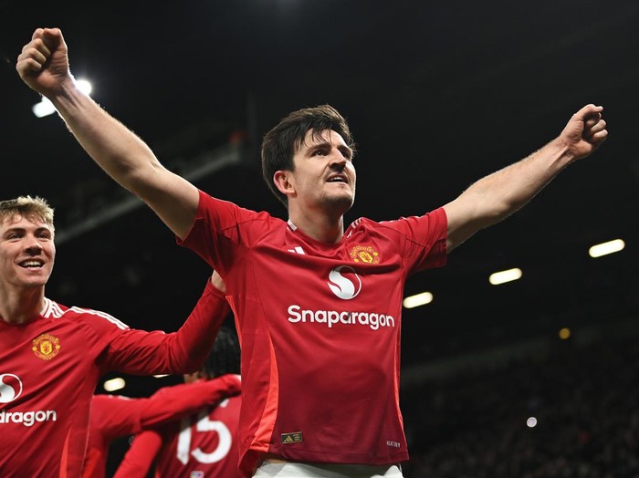 MANCHESTER, ENGLAND - FEBRUARY 07: Harry Maguire of Manchester United celebrates scoring his team's second goal during the Emirates FA Cup Fourth Round match between Manchester United and Leicester City at Old Trafford on February 07, 2025 in Manchester, England. (Photo by Gareth Copley/Getty Images)