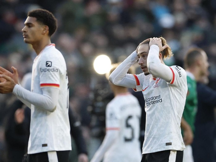 Soccer Football - FA Cup - Fourth Round - Plymouth Argyle v Liverpool - Home Park, Plymouth, Britain - February 9, 2025 Liverpool's Kostas Tsimikas looks dejected after the match Action Images via Reuters/Peter Cziborra