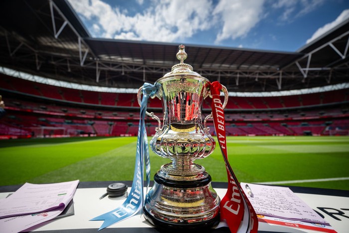LONDON, ENGLAND - MAY 25: A detailed view of the Emirates FA Cup trophy on a plinth on the inside of the stadium prior to the  Emirates FA Cup Final match between Manchester City and Manchester United at Wembley Stadium on May 25, 2024 in London, England. (Photo by Ash Donelon/Manchester United via Getty Images)