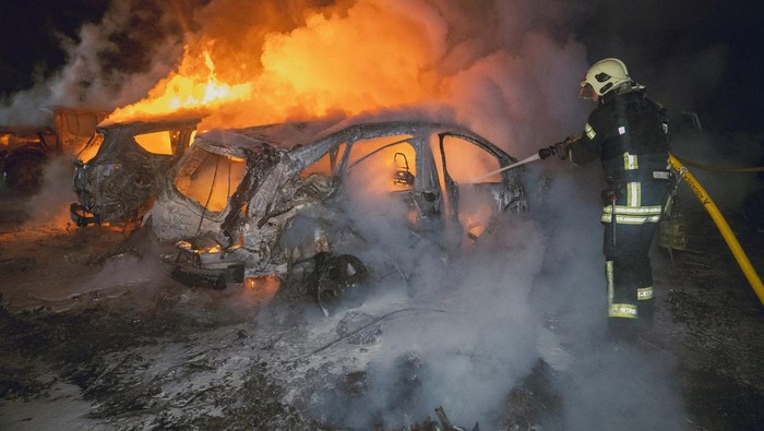 Firefighters work at a site of a residential area hit by a Russian drone strike, amid Russias attack on Ukraine, in Sumy, Ukraine, in this handout picture released on February 10, 2025. Press service of the State Emergency Service of Ukraine in Sumy region/Handout via REUTERS ATTENTION EDITORS - THIS IMAGE HAS BEEN SUPPLIED BY A THIRD PARTY. DO NOT OBSCURE LOGO.