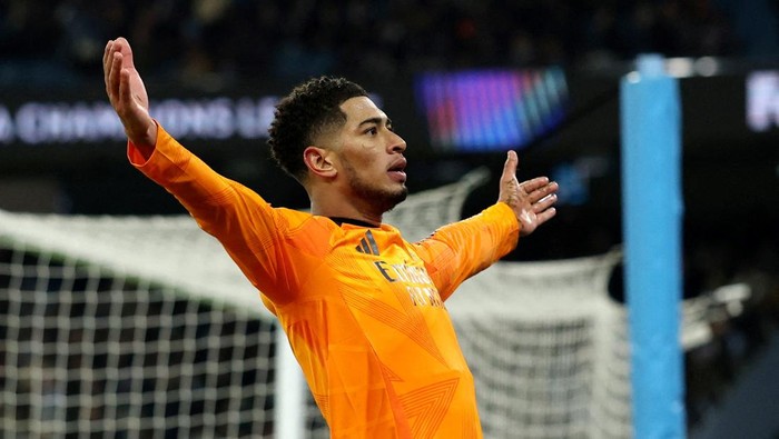 Soccer Football - Champions League - Knockout Phase Playoff - First Leg - Manchester City v Real Madrid - Etihad Stadium, Manchester, Britain - February 11, 2025  Real Madrids Jude Bellingham celebrates scoring their third goal REUTERS/Phil Noble     TPX IMAGES OF THE DAY