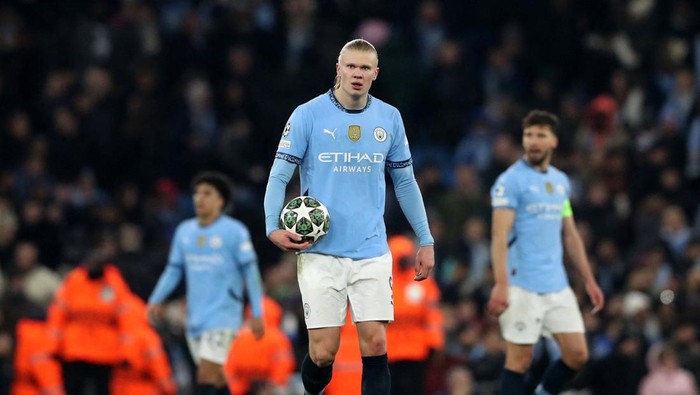 Manchester City Soccer Football - Champions League - Knockout Phase Playoff - First Leg - Manchester City v Real Madrid - Etihad Stadium, Manchester, Britain - February 11, 2025 Manchester Citys Erling Haaland reacts after Real Madrids Jude Bellingham scored their third goal REUTERS/Scott Heppell