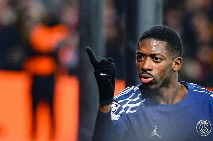 Ousmane Dembele Paris Saint-Germains French forward #10 Ousmane Dembele celebrates after scoring his teams third goal during the UEFA Champions League knockout phase play-off 1st leg football match between Stade Brestois 29 (Brest) and Paris Saint-Germain (PSG) at the Roudourou Stadium in Guingamp, western France, on February 11, 2025. (Photo by FRED TANNEAU / AFP)