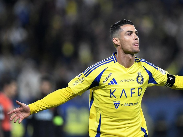 Soccer Football - Saudi Pro League - Al Nassr v Al Fayah - Al-Awwal Park, Riyadh, Saudi Arabia - February 7, 2025 Al Nassr's Cristiano Ronaldo celebrates scoring their third goal REUTERS/Stringer