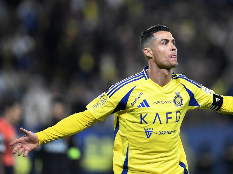 Soccer Football - Saudi Pro League - Al Nassr v Al Fayah - Al-Awwal Park, Riyadh, Saudi Arabia - February 7, 2025 Al Nassr's Cristiano Ronaldo celebrates scoring their third goal REUTERS/Stringer