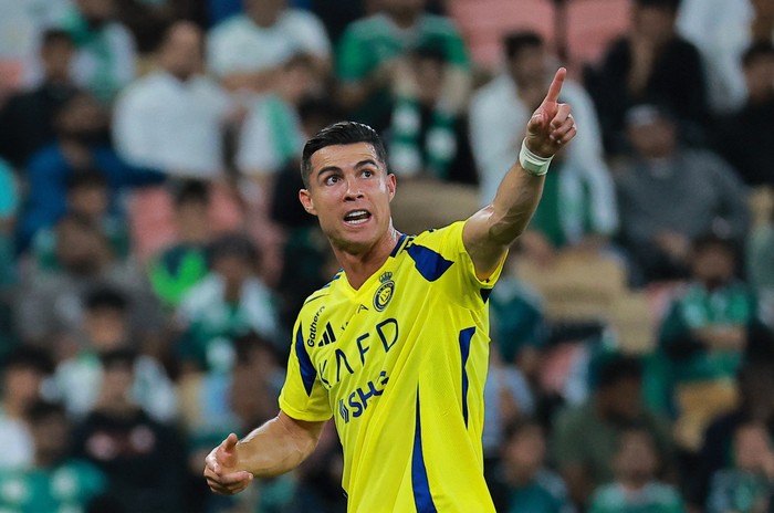 Cristiano Ronaldo Soccer Football - Saudi Pro League - Al Ahli v Al Nassr - King Abdullah Sports City, Jeddah, Saudi Arabia - February 13, 2025 Al Nassrs Cristiano Ronaldo reacts after being substituted REUTERS/Stringer