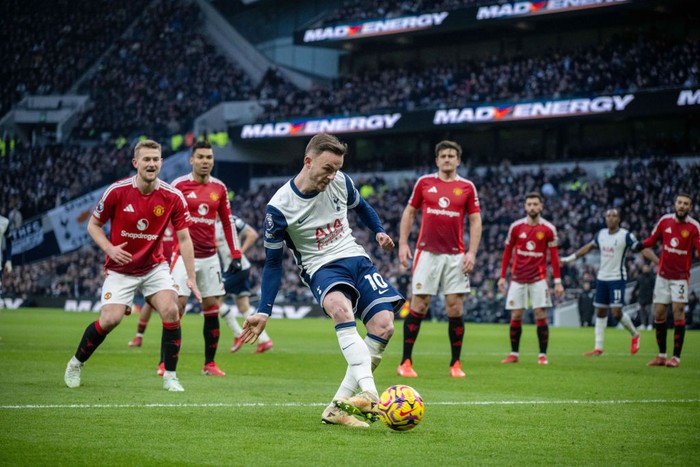 LONDON, ENGLAND - FEBRUARY 16: James Maddison of Tottenham Hotspur FC  scoring a opening goal during the Premier League match between Tottenham Hotspur FC and Manchester United FC at Tottenham Hotspur Stadium on February 16, 2025 in London, England. (Photo by Sebastian Frej/MB Media/Getty Images)