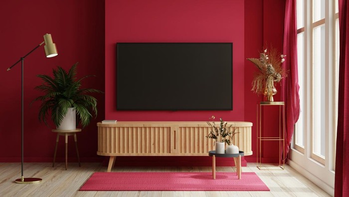 TV on the cabinet in terbaru living room on white viva magenta wall background.3d rendering