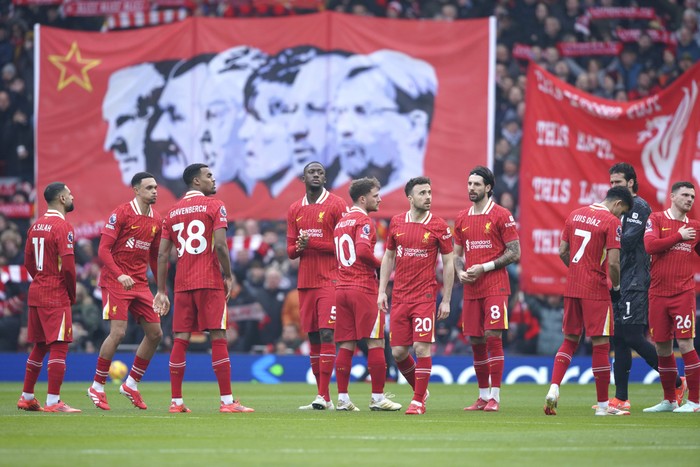 Liverpool players ahead the English Premier League soccer match between Liverpool and Wolverhampton Wanderers at Anfield Stadium in Liverpool, Sunday, Feb. 16, 2025. (AP Photo/Ian Hodgson)