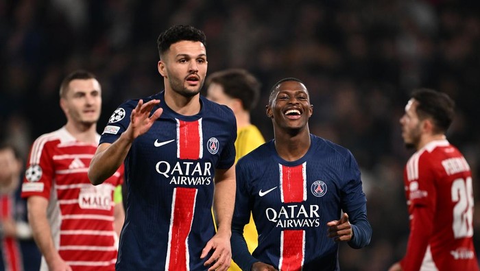 PARIS, FRANCE - FEBRUARY 19: Nuno Mendes of Paris Saint-Germain celebrates scoring his teams fifth goal with teammates during the UEFA Champions League 2024/25 League Knockout Play-off Second Leg match between Paris Saint-Germain and Stade Brestois 29 at Parc des Princes on February 19, 2025 in Paris, France. (Photo by Dan Mullan - UEFA/UEFA via Getty Images)