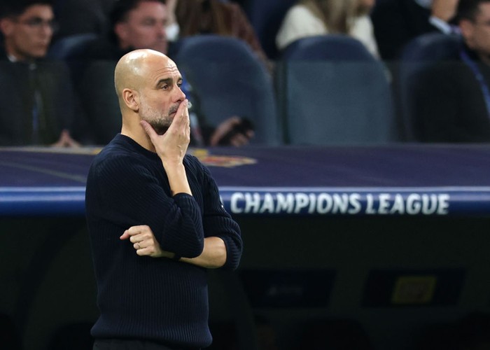 MADRID, SPAIN - FEBRUARY 19: Pep Guardiola, Manager of Manchester City, looks dejected during the UEFA Champions League 2024/25 League Knockout Play-off second leg match between Real Madrid C.F. and Manchester City at Santiago Bernabeu Stadium on February 19, 2025 in Madrid, Spain. (Photo by Clive Brunskill/Getty Images)