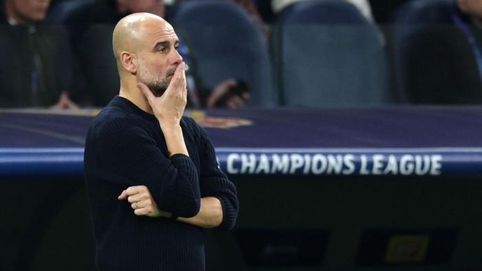 Pep Guardiola MADRID, SPAIN - FEBRUARY 19: Pep Guardiola, Manager of Manchester City, looks dejected during the UEFA Champions League 2024/25 League Knockout Play-off second leg match between Real Madrid C.F. and Manchester City at Santiago Bernabeu Stadium on February 19, 2025 in Madrid, Spain. (Photo by Clive Brunskill/Getty Images)