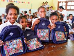 Telkomsel Distribusikan Ribuan Tas Sekolah ke Pelajar di Sumatera-Papua