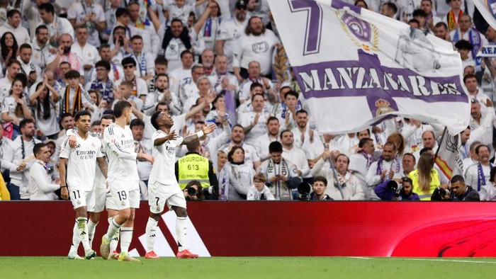 2201530213 MADRID, SPAIN - FEBRUARY 23: Vinicius Junior player of Real Madrid celebrates with his teammates after scoring a goal during the La Liga match between Real Madrid CF and Girona FC at Estadio Santiago Bernabeu on February 23, 2025 in Madrid, Spain. (Photo by David S. Bustamante/Real Madrid via Getty Images)