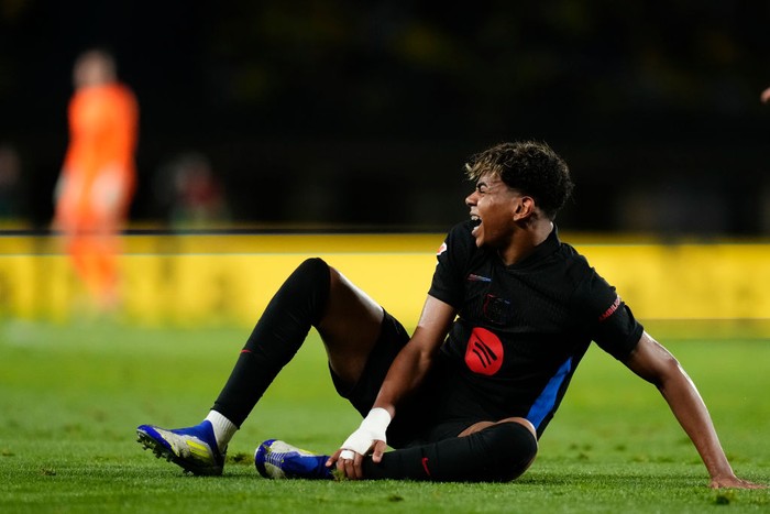 Lamine Yamal right winger of Barcelona and Spain lies injured on the pitch during the LaLiga match between UD Las Palmas and FC Barcelona at Estadio Gran Canaria on February 22, 2025 in Las Palmas, Spain. (Photo by Jose Breton/Pics Action/NurPhoto via Getty Images)
