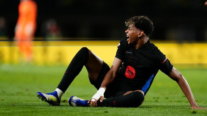 Lamine Yamal right winger of Barcelona and Spain lies injured on the pitch during the LaLiga match between UD Las Palmas and FC Barcelona at Estadio Gran Canaria on February 22, 2025 in Las Palmas, Spain. (Photo by Jose Breton/Pics Action/NurPhoto via Getty Images)