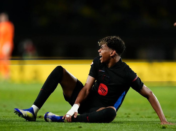 Lamine Yamal right winger of Barcelona and Spain lies injured on the pitch during the LaLiga match between UD Las Palmas and FC Barcelona at Estadio Gran Canaria on February 22, 2025 in Las Palmas, Spain. (Photo by Jose Breton/Pics Action/NurPhoto via Getty Images)