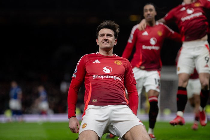 MANCHESTER, ENGLAND - FEBRUARY 26: Harry Maguire of Manchester United celebrates scoring their third goal during the Premier League match between Manchester United FC and Ipswich Town FC at Old Trafford on February 26, 2025 in Manchester, England. (Photo by Ash Donelon/Manchester United via Getty Images)