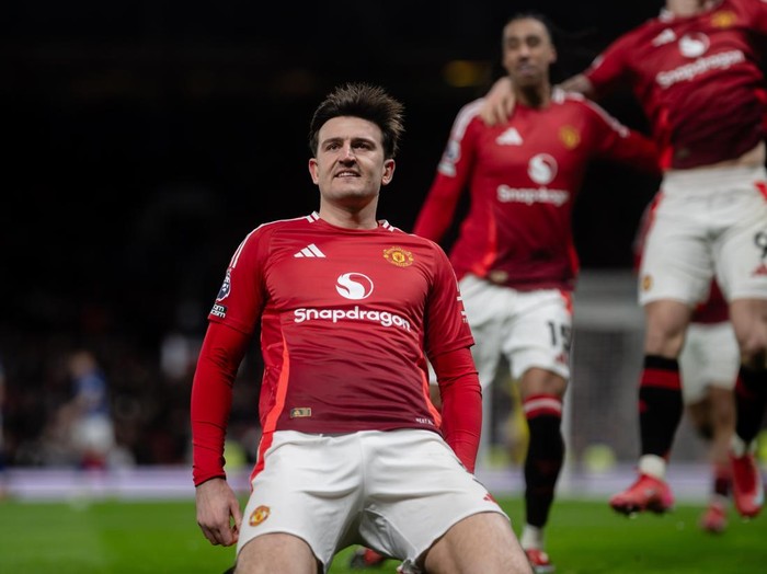 MANCHESTER, ENGLAND - FEBRUARY 26: Harry Maguire of Manchester United celebrates scoring their third goal during the Premier League match between Manchester United FC and Ipswich Town FC at Old Trafford on February 26, 2025 in Manchester, England. (Photo by Ash Donelon/Manchester United via Getty Images)