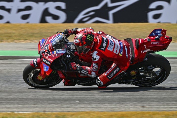 Francesco Bagnaia Italys rider Francesco Bagnaia steers his motorcycle during the qualifying round of Thailands MotoGP at the Chang International Circuit in Buriram, Thailand, Saturday, March 1, 2025. (AP Photo/Kittinun Rodsupan)
