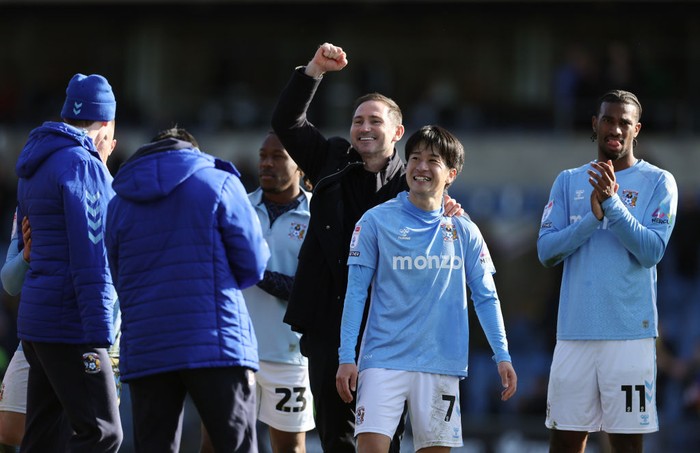 OXFORD, ENGLAND - MARCH 01: Frank Lampard manager / head coach of Coventry City celebrates victory with Tatsuhiro Sakamoto after the Sky Bet Championship match between Oxford United FC and Coventry City FC at Kassam Stadium on March 01, 2025 in Oxford, England. (Photo by Catherine Ivill - AMA/Getty Images)