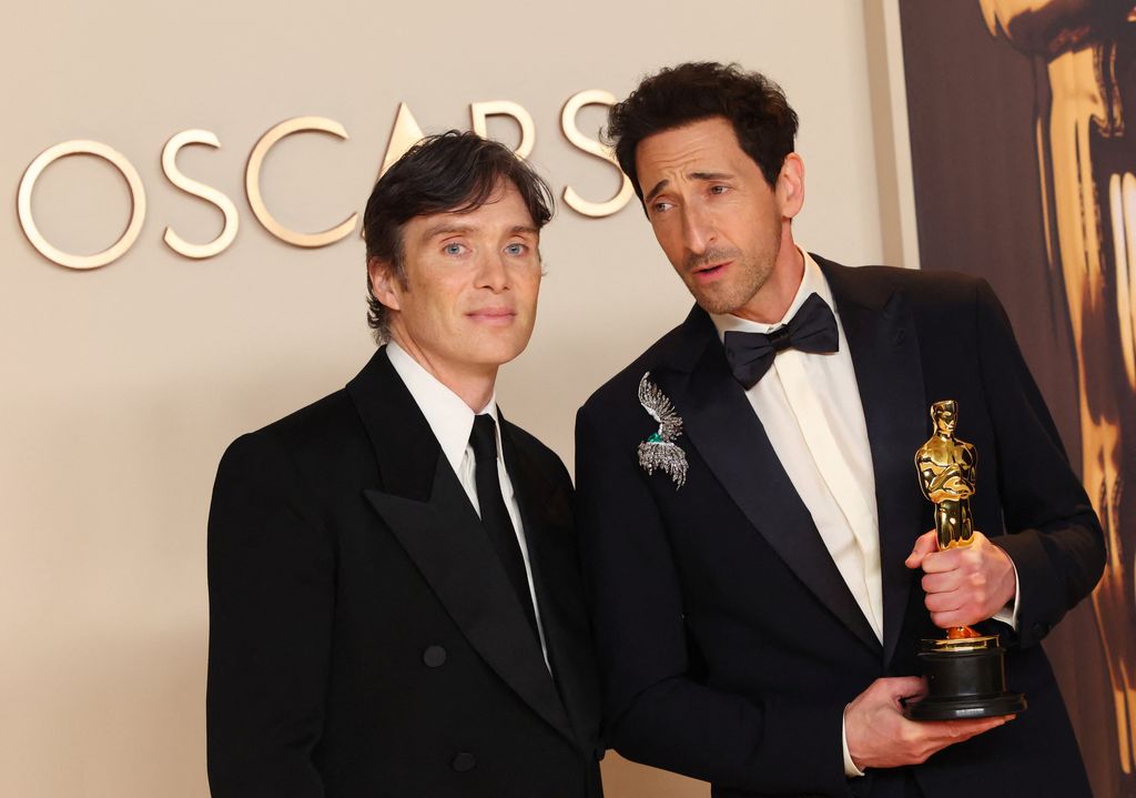 Adrien Brody holding the Oscar for Best Actor for 