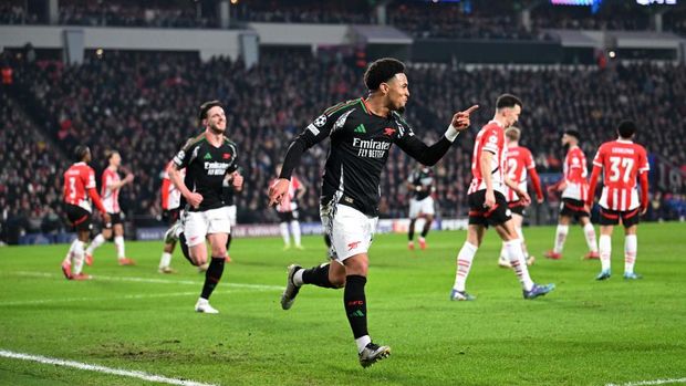 EINDHOVEN, NETHERLANDS - MARCH 04: Ethan Nwaneri of Arsenal celebrates scoring his team's second goal during the UEFA Champions League 2024/25 UEFA Champions League 2024/25 Round of 16 first leg match between PSV and Arsenal FC at PSV Stadion on March 04, 2025 in Eindhoven, Netherlands. (Photo by David Price/Arsenal FC via Getty Images)